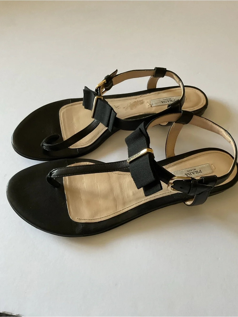 PRADA BLACK LEATHER T-STRAP SANDALS WITH BOW DETAIL GOLD HARDWARE 39.5 / 8.5